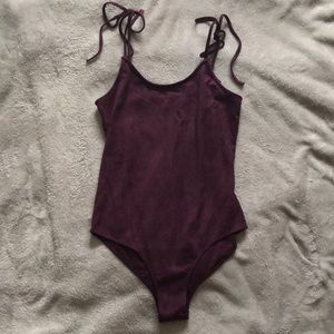 Purple velvet body suit NEVER WORN